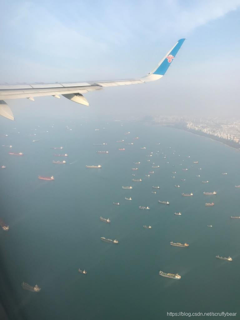 Took off, window view to Singapore Strait