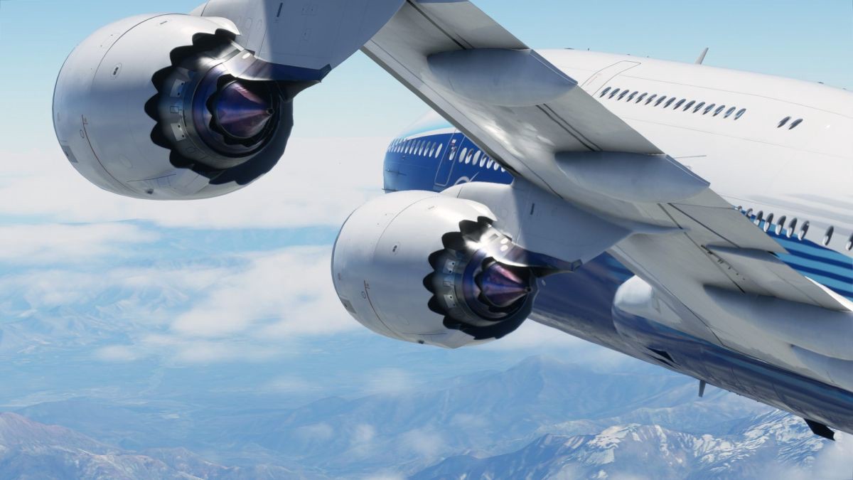 A Boeing 747 in flight, the camera focused closely on two of it’s massive four engines.