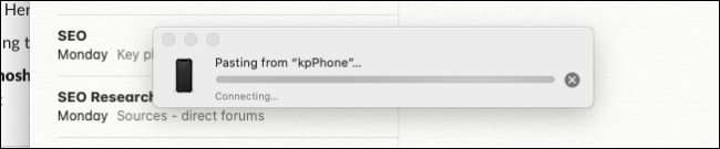 Mac showing progress bar for pasting photo from iPhone