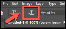 Click the T icon with the horizontal and vertical arrows.