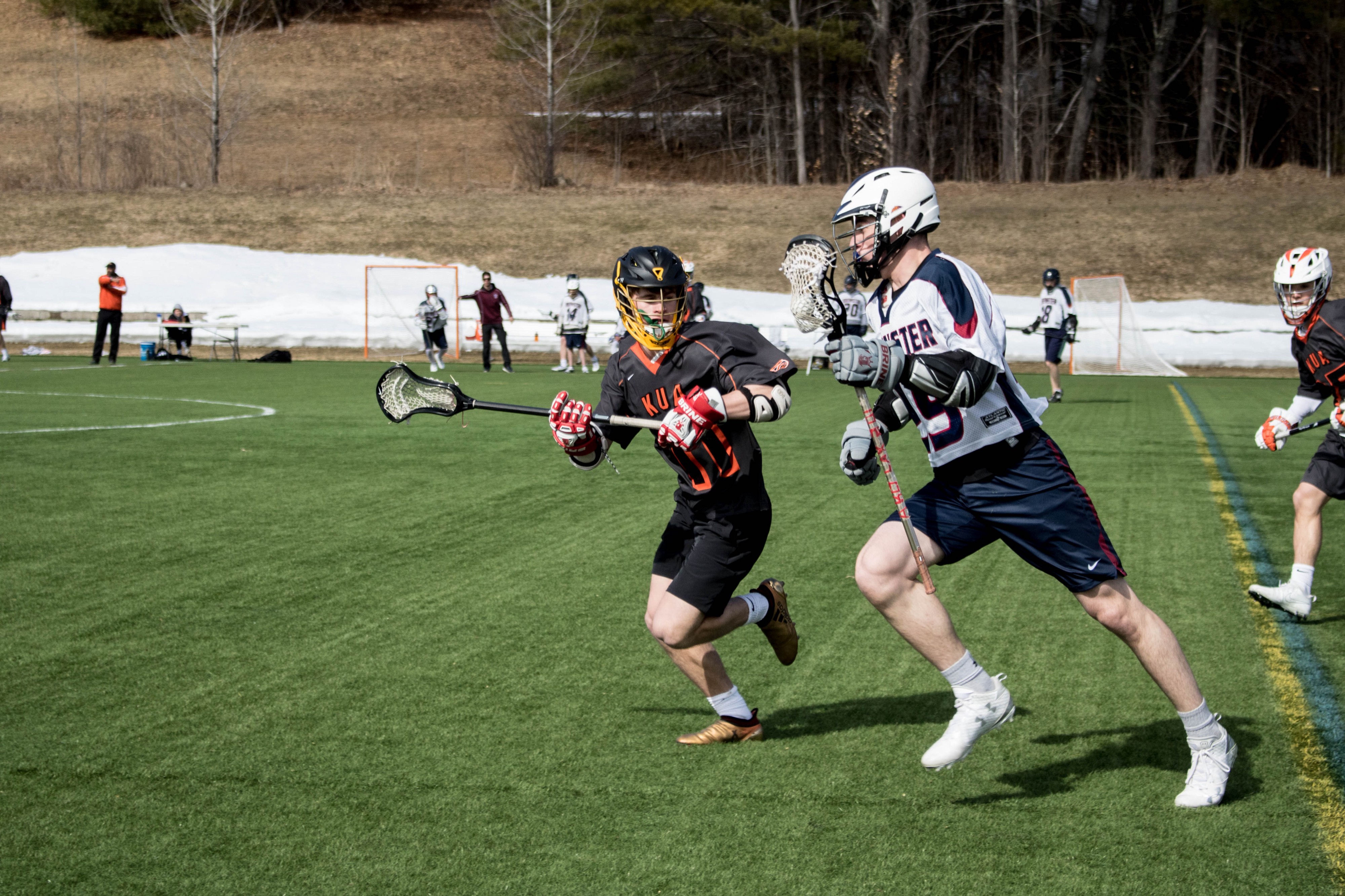 Lacrosse players — Photo by Forest Simon on Unsplash