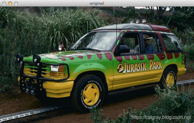 Figure 1: Our example image — a Jurassic Park Tour Jeep.