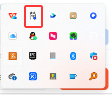 \\Windows任务栏右下角的截图，圈出Ollama的羊驼图标。]