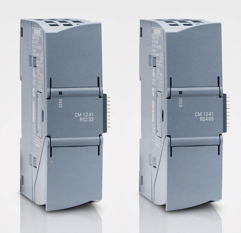 A close-up of several grey electronic devicesDescription automatically generated